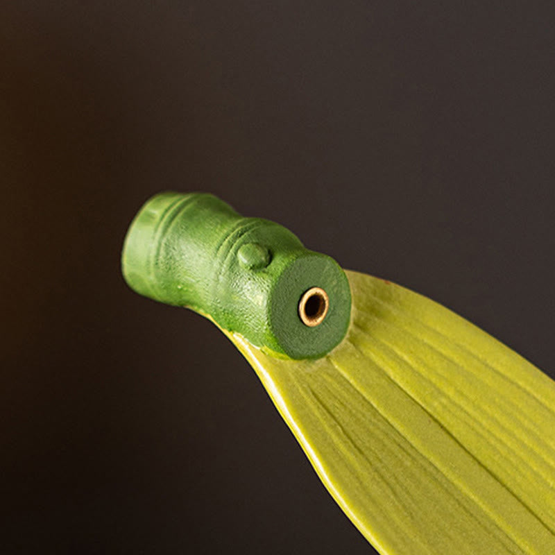 Panda Ceramic Incense Burner - Close-up of brass-lined hole on green ceramic bamboo, zen decor