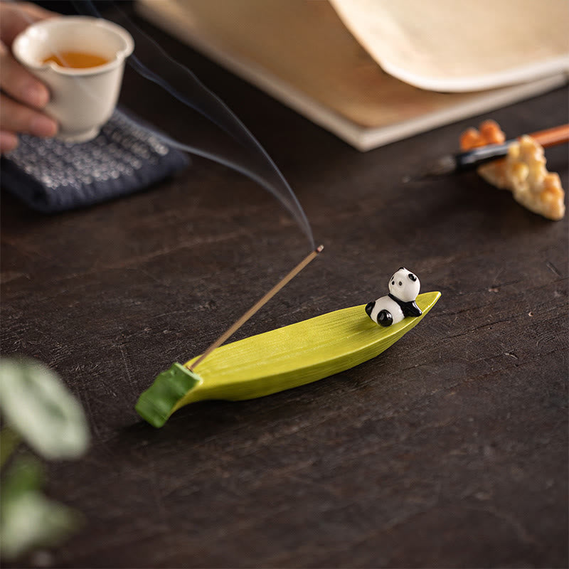 Panda Ceramic Incense Burner - Panda on green leaf with smoke, open book and brushes nearby