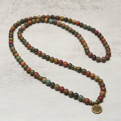 Red Turquoise Lotus Warm Mala – full-length red turquoise strand with antique brass lotus, Passionate