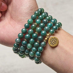 Moss Agate Lotus Beaded Healing Mala – multi-wrap moss agate bracelet on wrist with lotus charm, Healing
