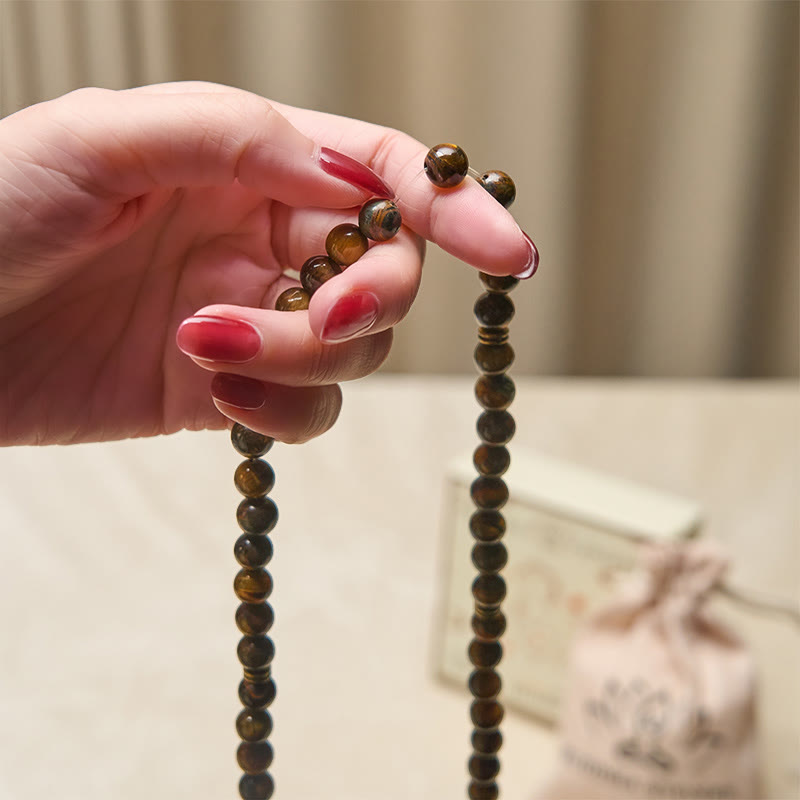 Tiger Eye Lotus Beaded Strength Mala – handheld tiger eye strand with golden chatoyant beads, Strength