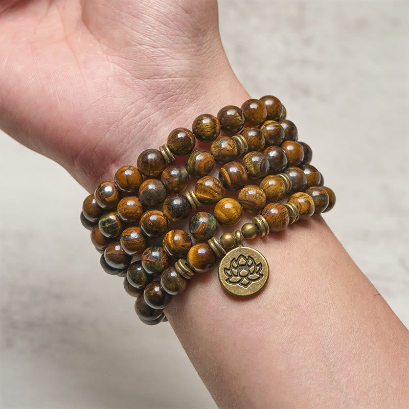 Tiger Eye Lotus Beaded Strength Mala – multi-wrap tiger eye bracelet on wrist with lotus charm, Bold