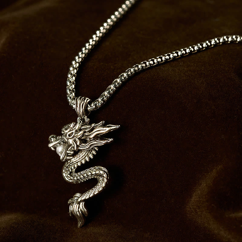 Copper Dragon Necklace – S-curve dragon on warm brown velvet, premium