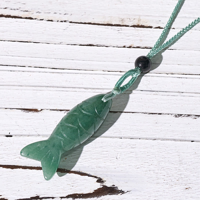 Koi Fish Crystal Necklace Pendant – pink rose quartz pendant worn showing pink cord match, healing jewelry