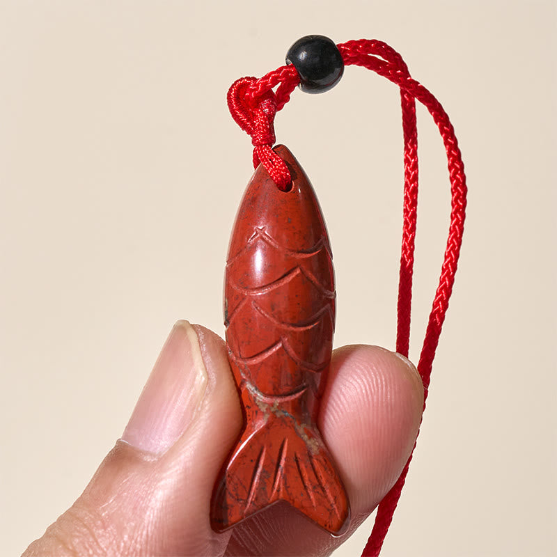 Koi Fish Crystal Necklace Pendant – pink crystal koi fish macro showing scale carving detail, rose quartz