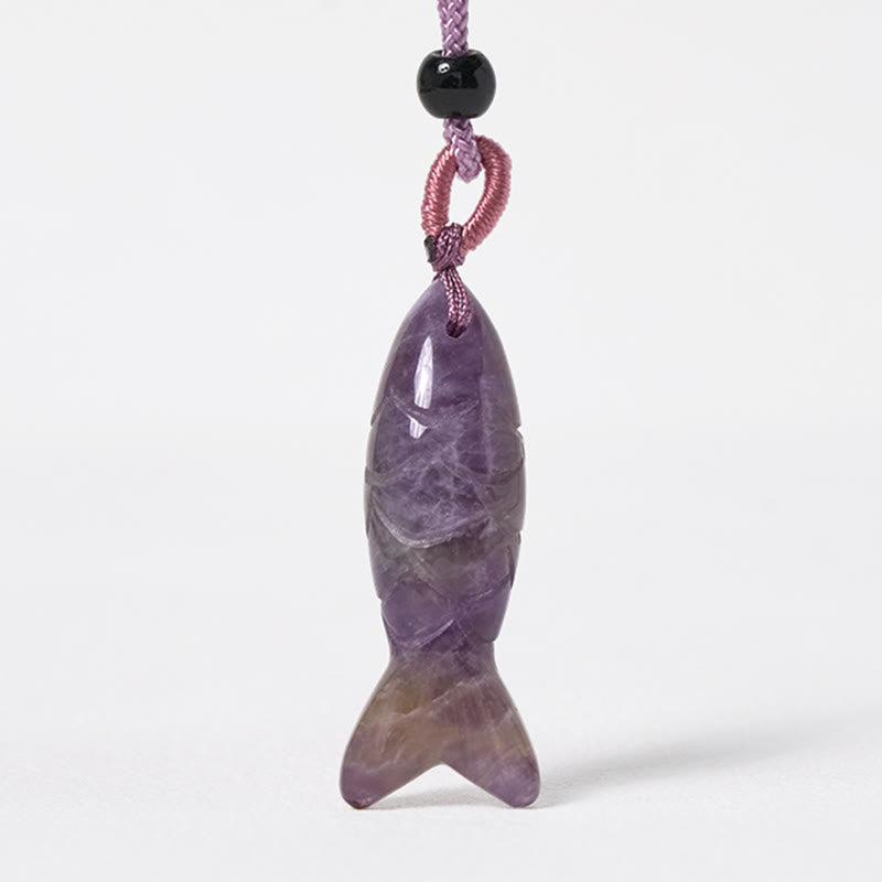 Koi Fish Crystal Necklace Pendant – purple amethyst pendant on white background frontal, crystal fish jewelry