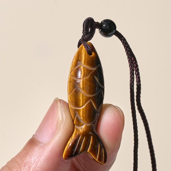 Koi Fish Crystal Necklace Pendant – green Indian agate pendant on white showing moss inclusions, gemstone