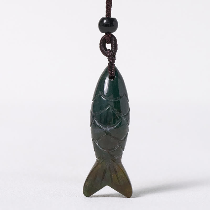 Koi Fish Crystal Necklace Pendant – green agate fish pendant on white background frontal, carved gemstone