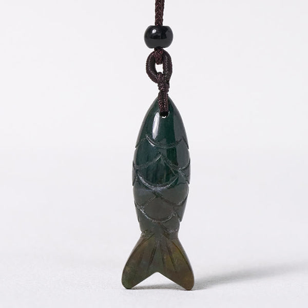 Koi Fish Crystal Necklace Pendant – green agate fish pendant on white background frontal, carved gemstone