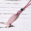 Koi Fish Crystal Necklace Pendant – pink rose quartz koi on weathered wood diagonal, carved fish pendant