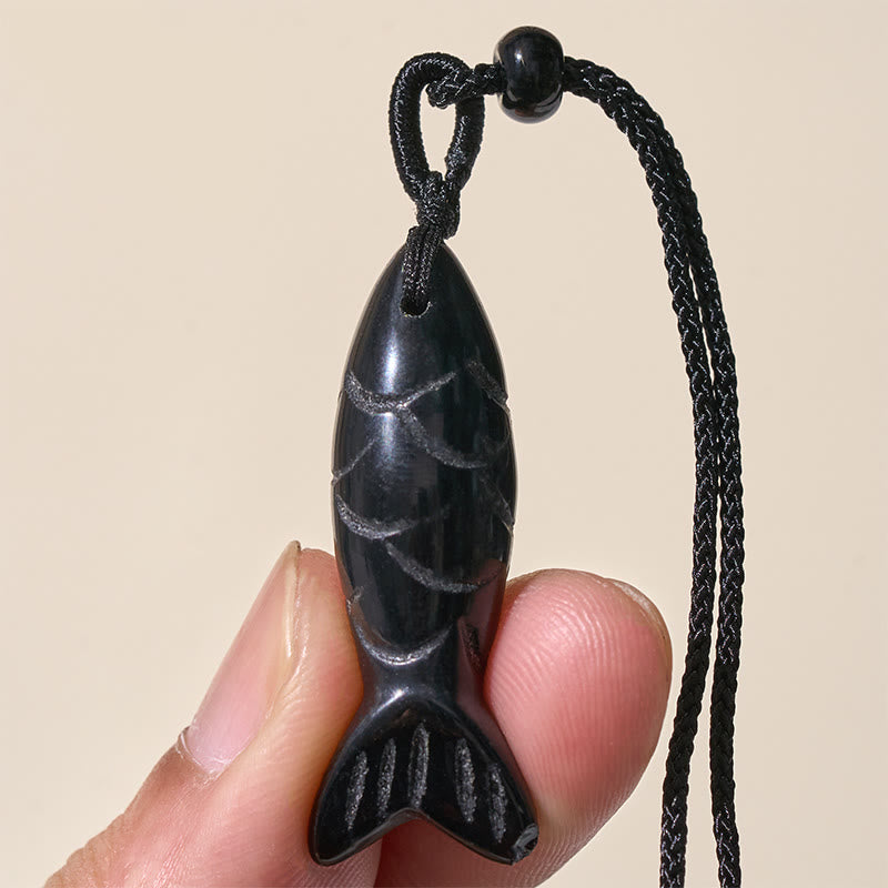 Koi Fish Crystal Necklace Pendant – amethyst pendant worn with purple cord and black bead, crystal jewelry