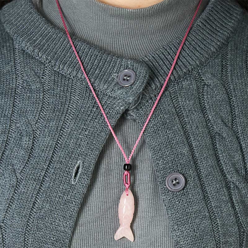 Koi Fish Crystal Necklace Pendant – rose quartz koi fish on pure white frontal view, pink crystal pendant