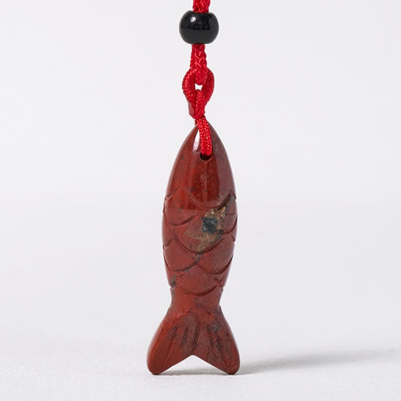 Koi Fish Crystal Necklace Pendant – green aventurine pendant three-quarter on white, carved fish gemstone