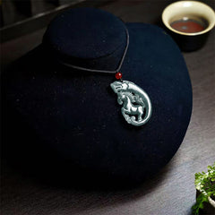 Jade Dragon Horse Necklace – green jade horse pendant on black velvet bust with tea setting, Prosperity