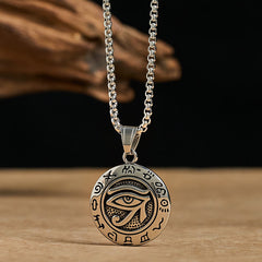 Titanium Steel Necklace – Silver evil eye medallion on box chain, tan wood and black backdrop