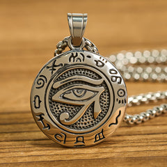 Titanium Steel Necklace – Polished Eye of Horus disc with stippled texture on honey wood, silver chain