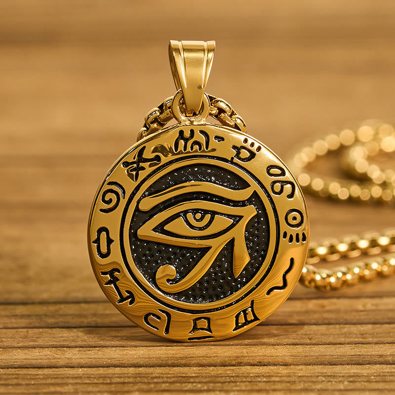 Gold Titanium Necklace – Gold Eye of Horus pendant on light wood with black background, PVD titanium