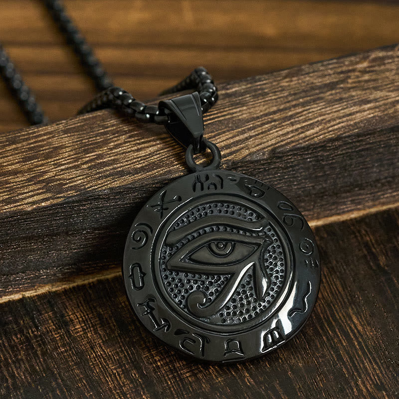 Black Titanium Necklace – Black PVD Eye of Horus with hieroglyphs on dark wood, gunmetal chain