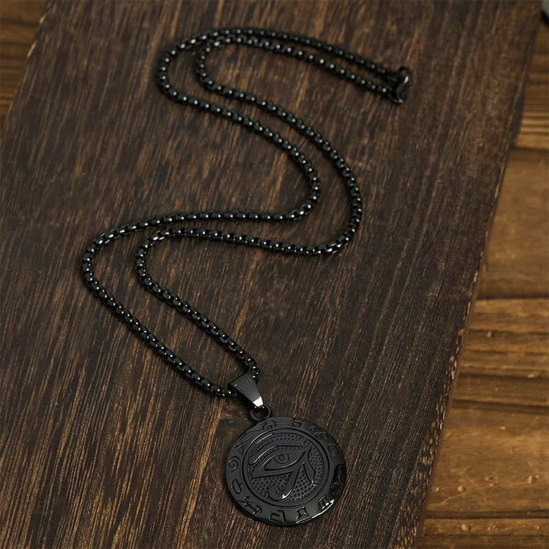 Black Titanium Necklace – Black titanium steel Eye of Horus S-curve on dark wood, lobster clasp