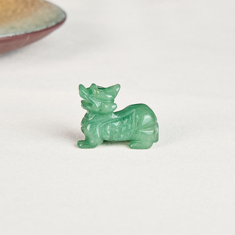 Choose Wisely Green Aventurine Pixiu – carved statue white background, aventurine crystal