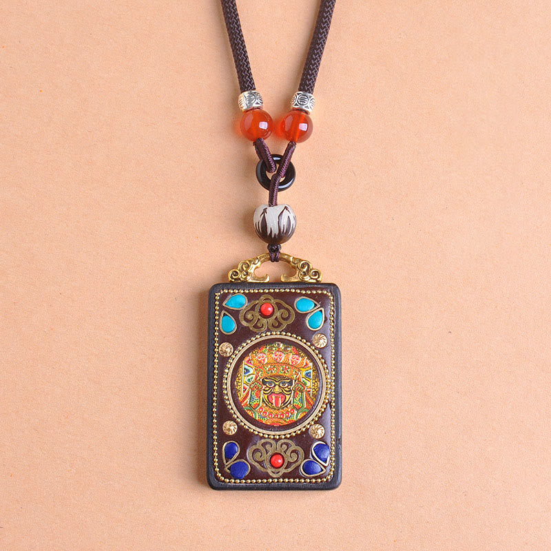 Zakiram Yin Yang Ebony Wood Pendant – centered on peach, gold-tone thangka jewelry