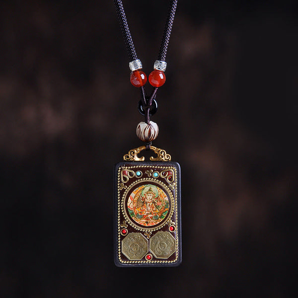 Zakiram Yin Yang Ebony Wood Pendant – dark bokeh, ornate deity medallion amulet