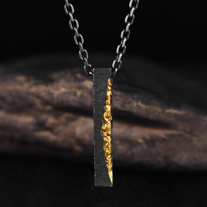 Om Mani Padme Hum Necklace – oxidized silver bar with exposed gold core on cable chain, front view, handmade necklace