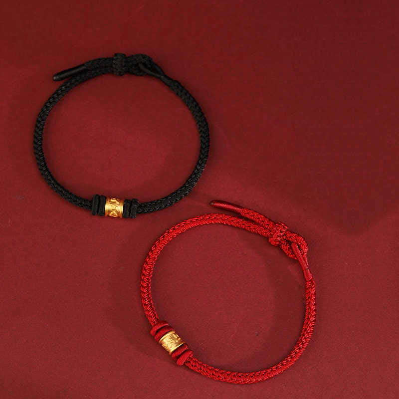 999 Gold Om Mani Padme Hum Red String Bracelet – two hands wearing red and black bracelets side by side, couple bracelet set