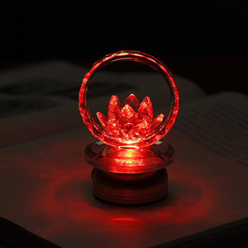 Red LED crystal lotus ring lamp on dark surface, color-changing lotus light
