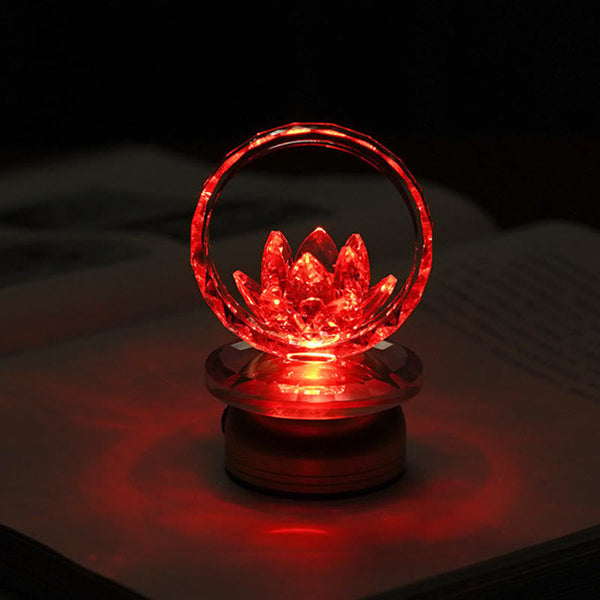 Red LED crystal lotus ring lamp on dark surface, color-changing lotus light
