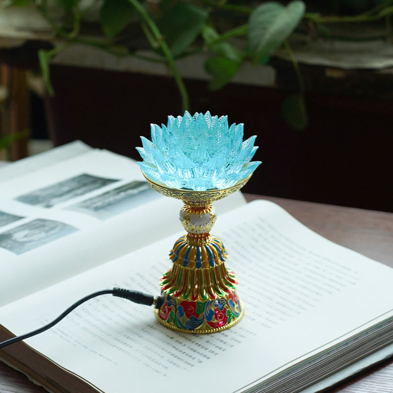 Lotus Liuli Glass Decor - turquoise blue glass lotus lamp with gold-plated enamel pedestal on open book, meditation room light