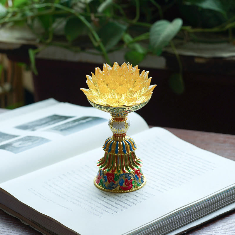 Lotus Liuli Glass Decor - illuminated red crystal lotus flower lamp on ornate bronze pedestal, glowing in dark meditation space