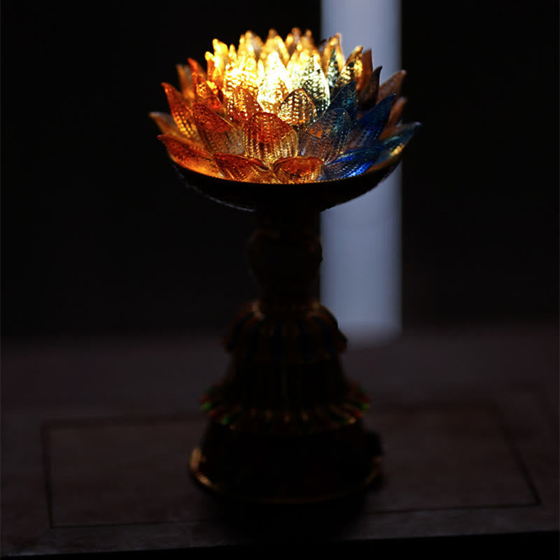 Lotus Liuli Glass Decor - color-changing LED lotus lamp with pink blue glowing petals on ornate brass pedestal, dark background