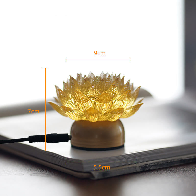 Lotus Liuli Lamp – golden lotus on polished brass base on open book, liuli decor