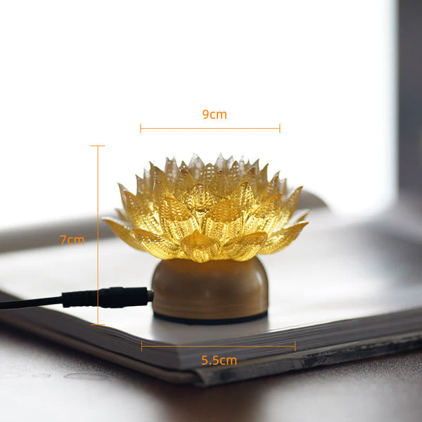 Lotus Liuli Lamp – golden lotus on polished brass base on open book, liuli decor