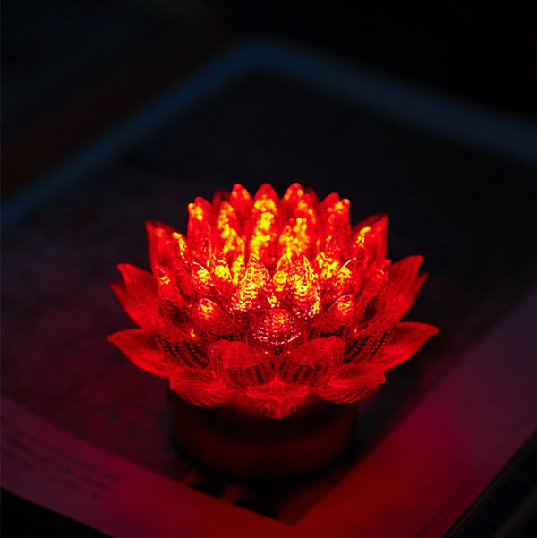Lotus Liuli Lamp – deep crimson bloom glowing on dark surface, red lotus light