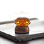 Lotus Liuli Lamp – warm glow through honey-toned petals on rounded base, liuli lotus