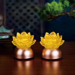 Pair of lotus liuli glass decorations on dark wood, copper base, liuli ornament