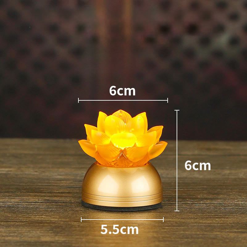 Amber golden lotus lamp with gold base on dark wood, liuli LED light