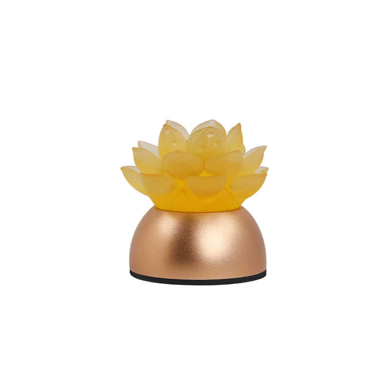 Front view of lotus liuli glass decoration on white background, copper base lotus
