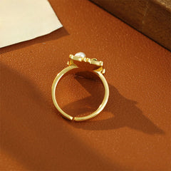 Vintage Lotus Pearl Copper Ring – side view showing adjustable open band and sculptural lotus detail, copper ring