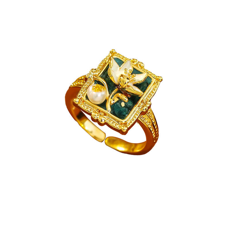 Vintage Lotus Pearl Copper Ring – clean white background, green stone with lotus inlay and pearl, adjustable ring