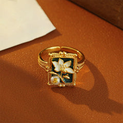 Vintage Lotus Pearl Copper Ring – milgrain frame with green enamel lotus and pearl bud on leather, lotus jewelry