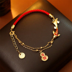 Koi Fish Wealth Gourd Red String Bracelet – close-up of koi fish and gourd charm detail in gold-tone metal