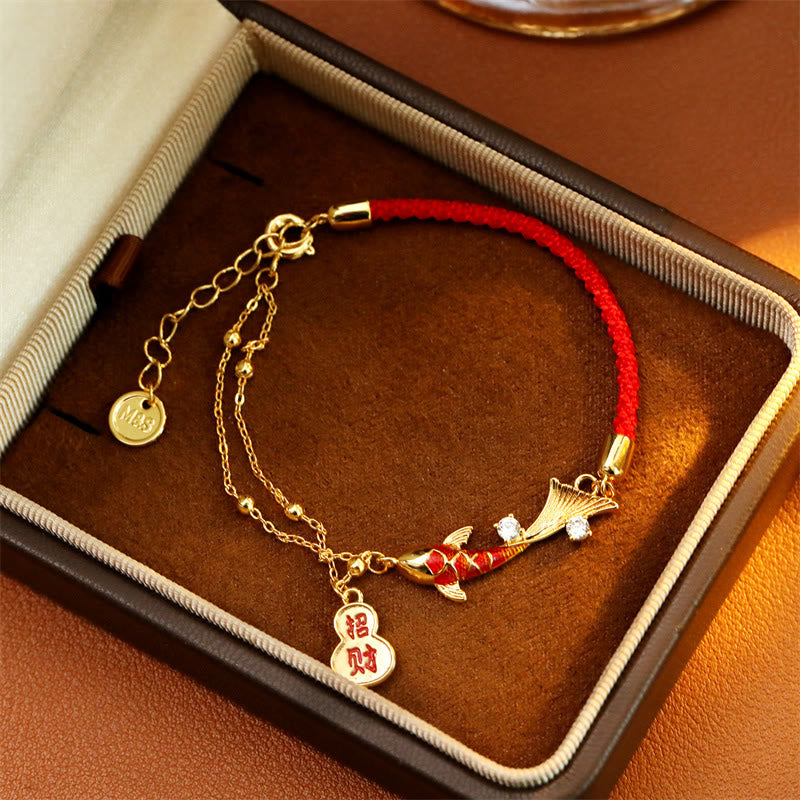 Koi Fish Wealth Gourd Red String Bracelet – macro detail of wealth gourd charm with engraved prosperity symbol