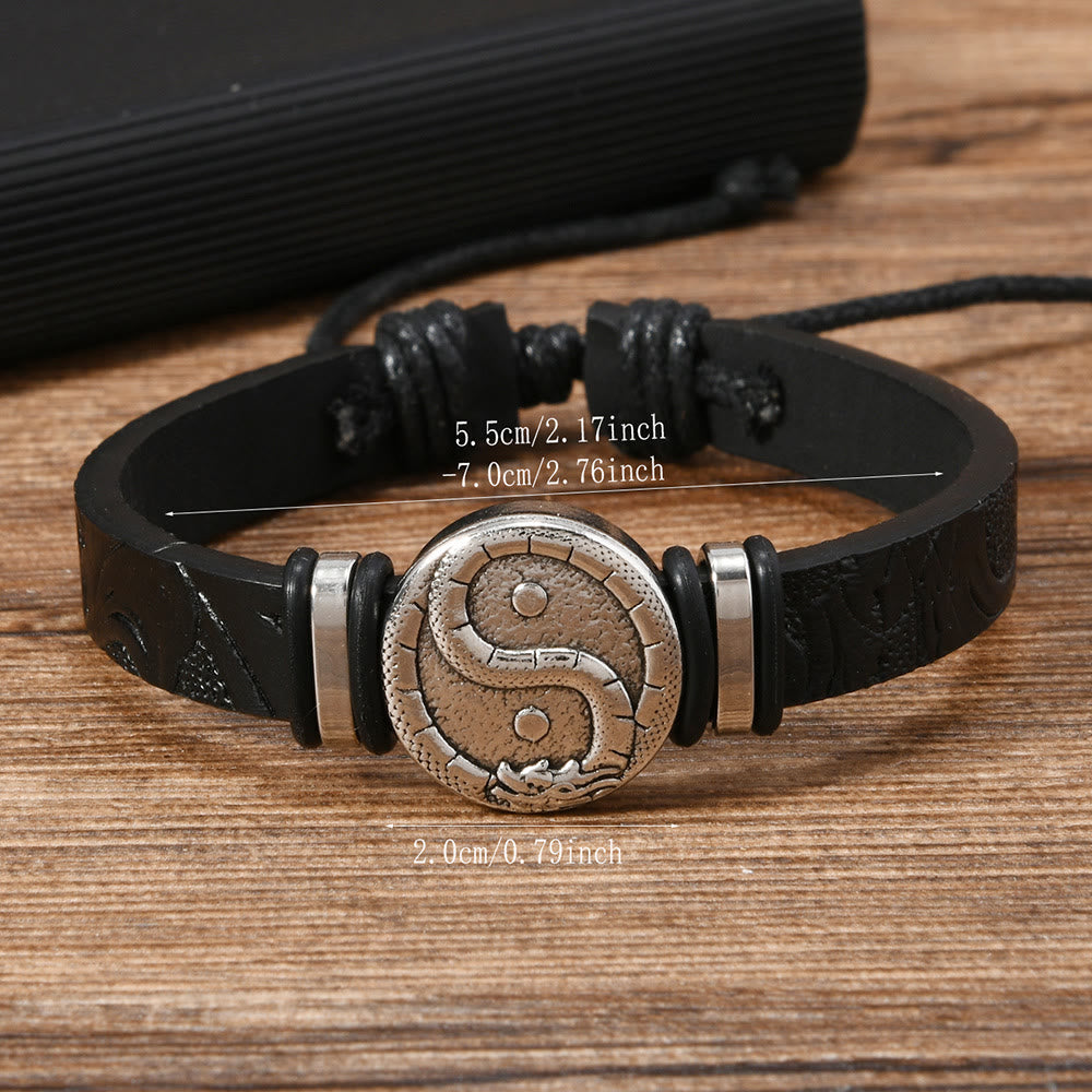 Leather Yin Yang Dragon Bracelet – size guide view showing 5.5-7.0cm adjustable fit on wood, Harmony