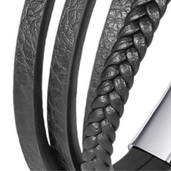 Leather Balance Bracelet – Black leather strands with silver eye charm close-up, white background