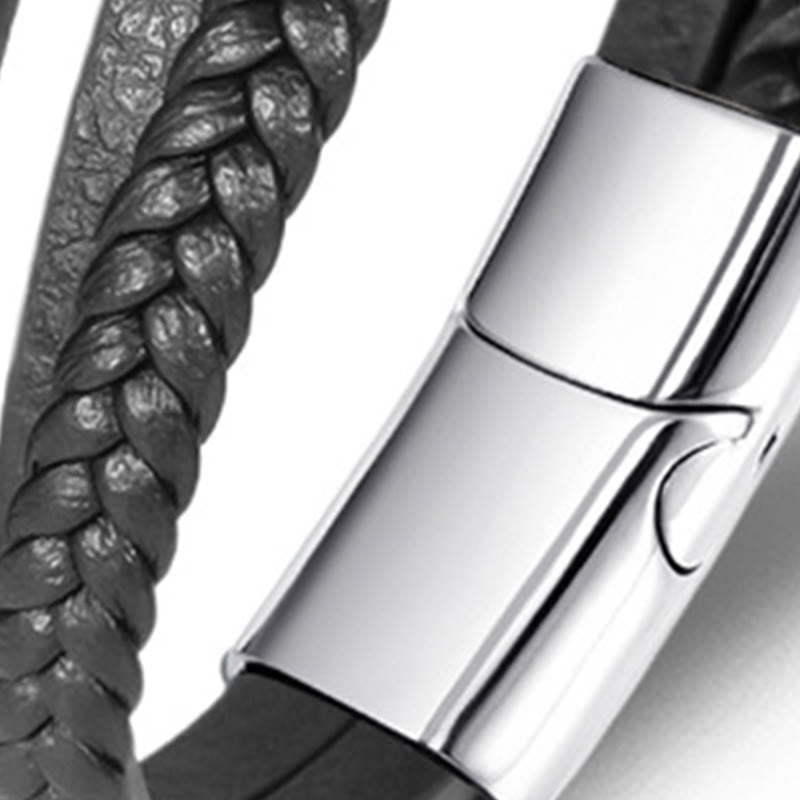 Braided Leather Bracelet – Woven black leather cord with silver clasp, macro detail on white