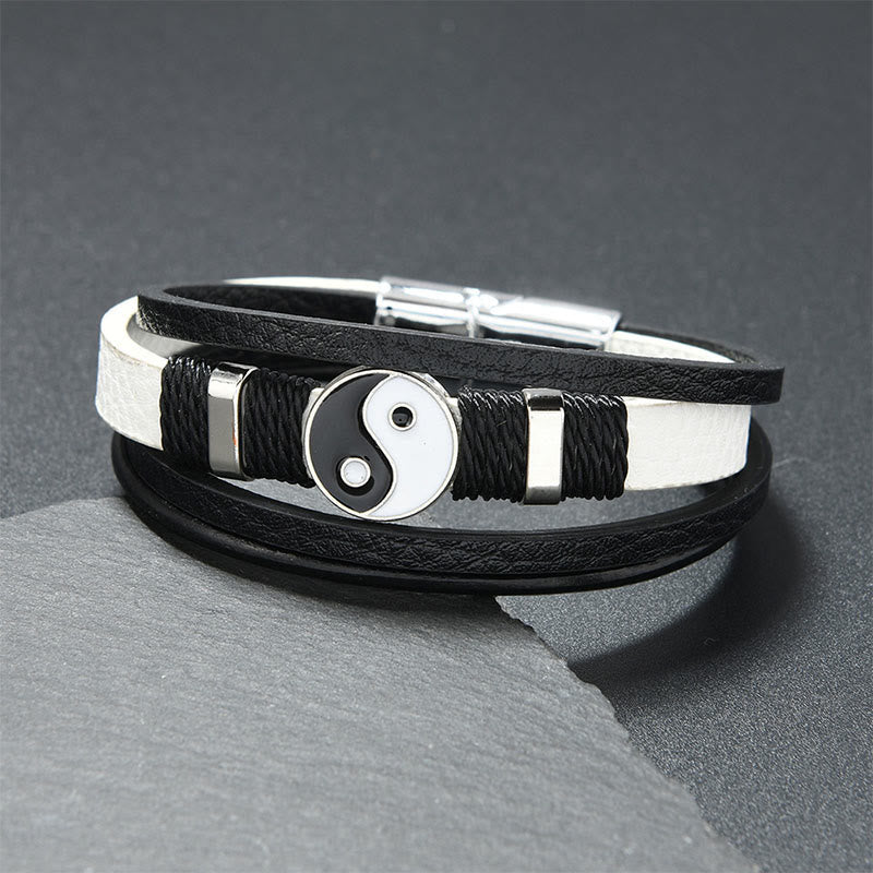 Yin Yang Leather Balance Bracelet – black and white dual-leather strap with silver yin-yang medallion on slate, unisex bra...