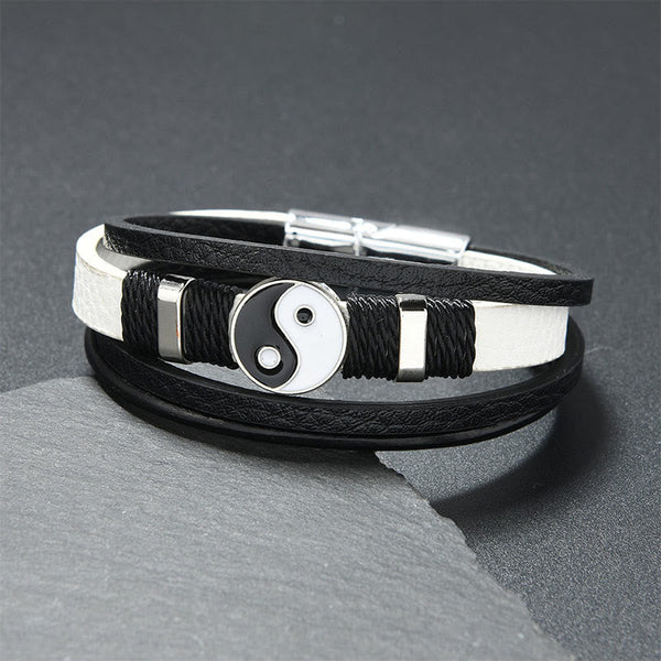 Yin Yang Leather Balance Bracelet – black and white dual-leather strap with silver yin-yang medallion on slate, unisex bra...